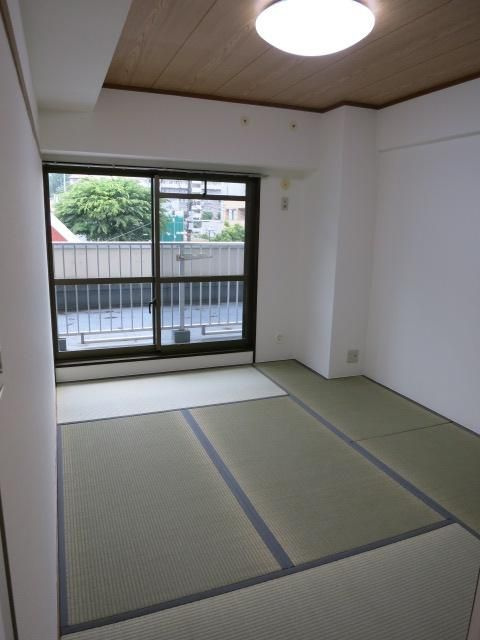 入間市駅前ビルの寝室