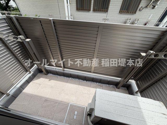 川崎市多摩区宿河原７丁目のアパートのバルコニー