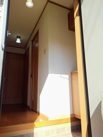 プリヴェイル中松山の玄関