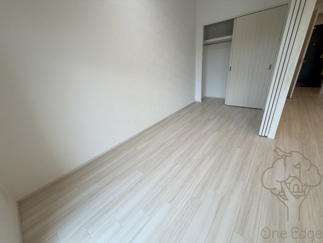 プレジオ塚本ASIANの寝室