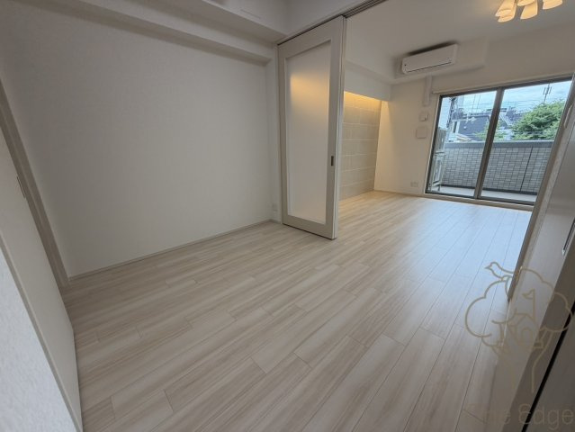 プレジオ塚本ASIANの寝室