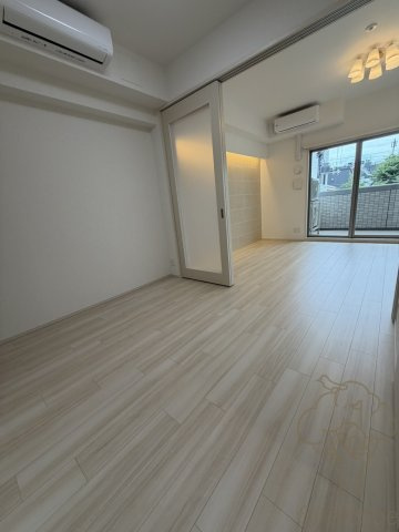 プレジオ塚本ASIANの寝室