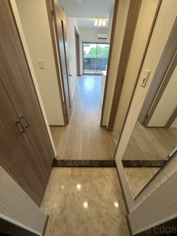 プレジオ塚本ASIANの玄関
