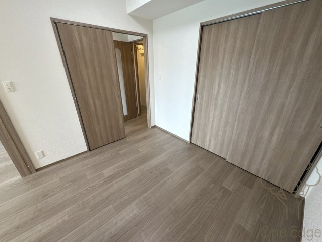 プレジオ塚本ASIANの寝室