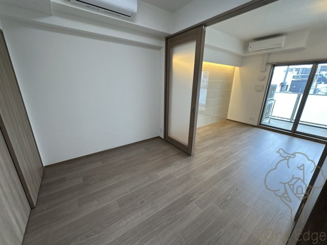 プレジオ塚本ASIANの寝室