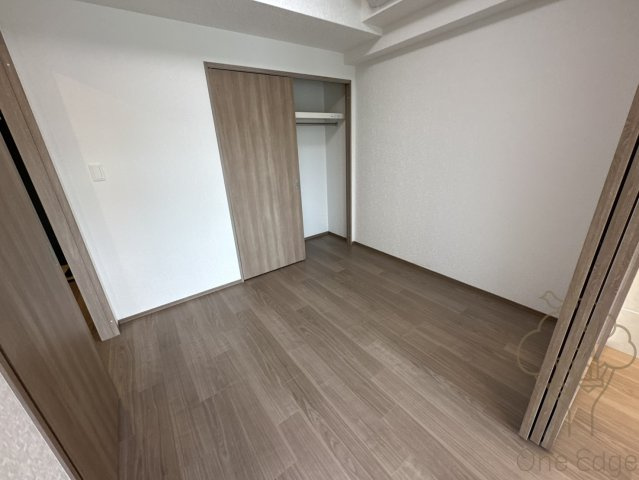プレジオ塚本ASIANの寝室