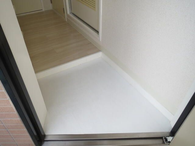 川崎市麻生区金程１丁目の賃貸マンションの玄関