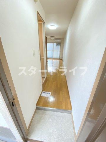 大阪市淀川区十三東１丁目の賃貸マンションの玄関