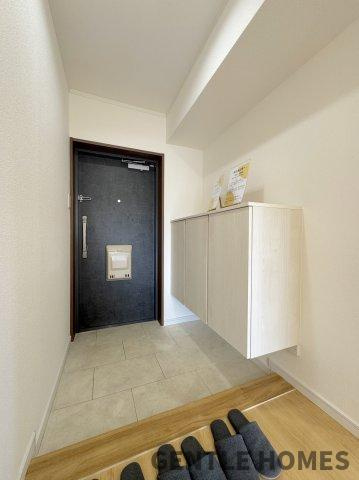三愛シティライフ博多南の玄関