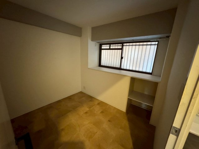 ロイヤルヒルズ待兼山の寝室