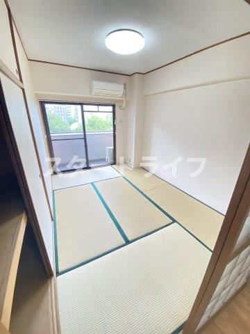 大阪市東淀川区東中島４丁目の賃貸マンションの寝室