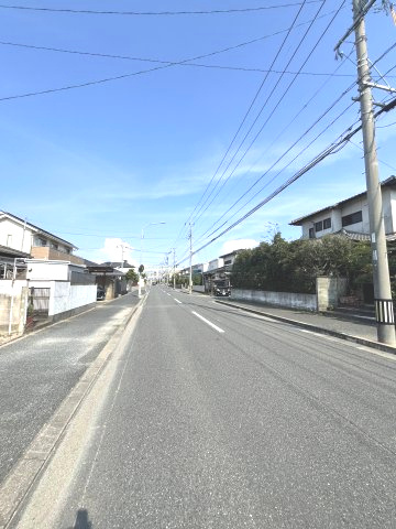 西区石丸3期　１号棟（全2棟）の前面道路含む現地写真
