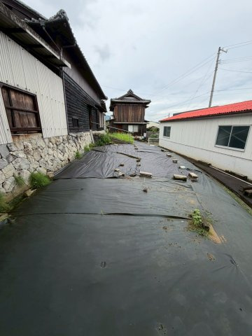 三豊市三野町　車庫兼作業場つきの和風住宅の庭|建物裏側のお庭（畑のため農地転用が必要です）