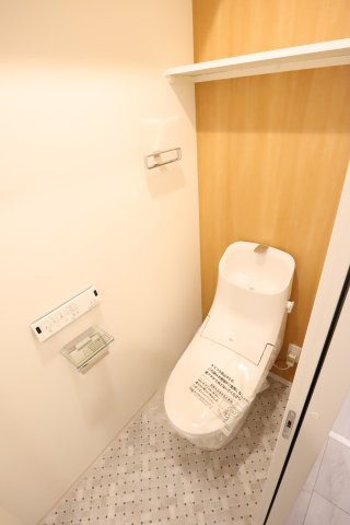 大阪市都島区内代町３丁目の賃貸マンションのトイレ