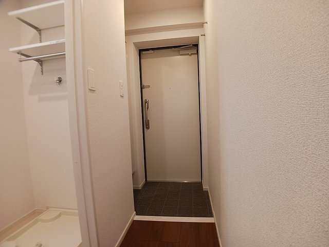 グランデ蒲生茜町の玄関