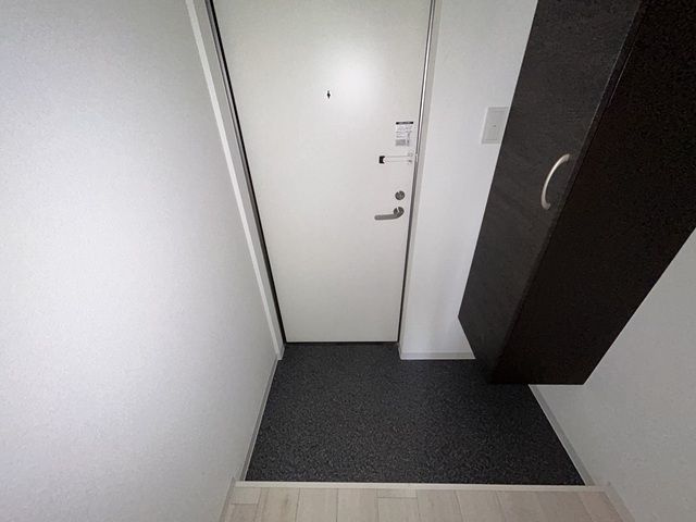 ジーメゾン松戸中和倉の玄関
