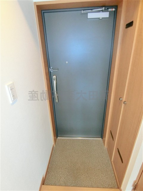 池上1DKマンションの玄関