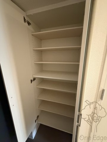 ファーストフィオーレ十三エリオの玄関