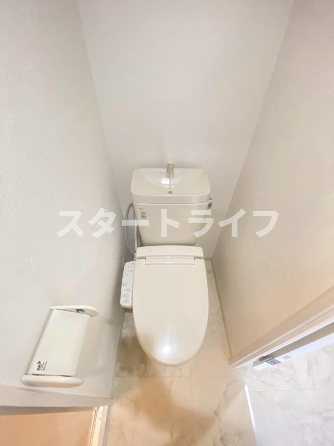 大阪市淀川区十三東３丁目の賃貸マンションのトイレ