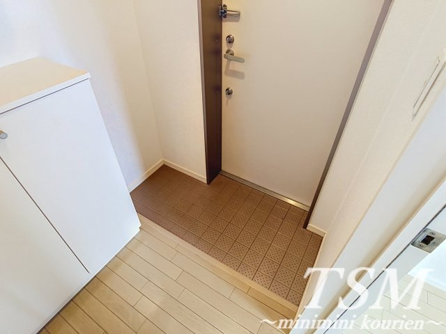 レジデンス　シェーネルの玄関