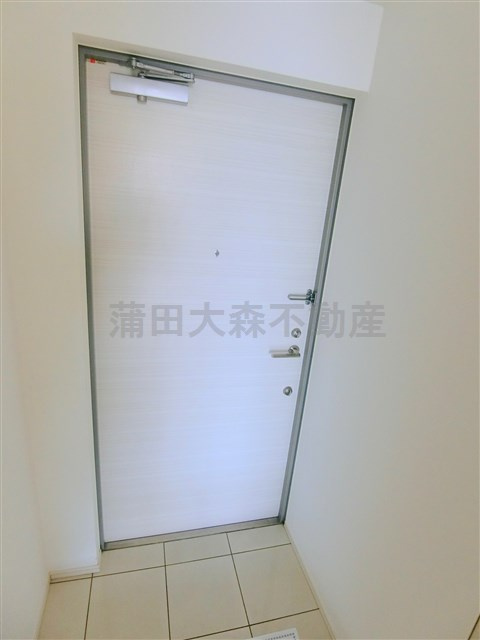 ウィスティリア大森山王の玄関
