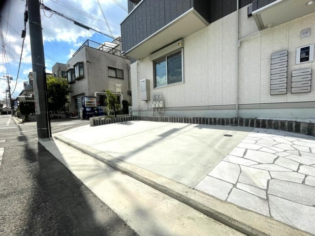アクシス北野田の駐車場