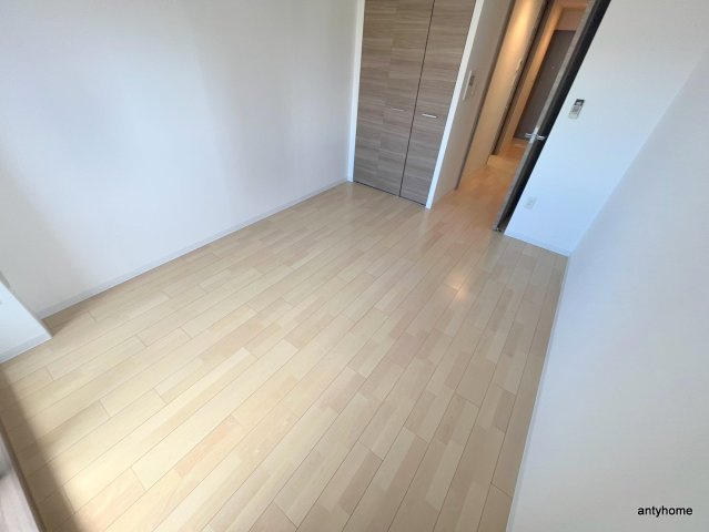 レジュールアッシュ南堀江　仲介手数料無料の寝室