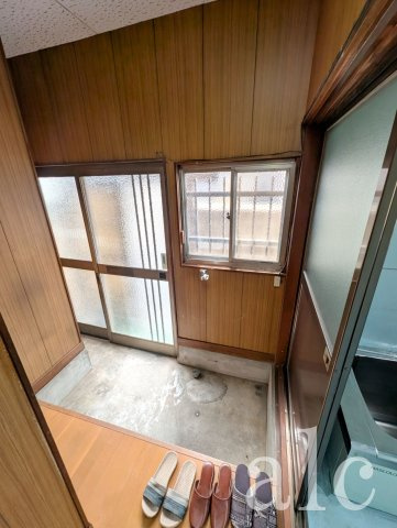 三山2　DIY戸建て住宅の玄関|玄関部　室内洗濯置き場

