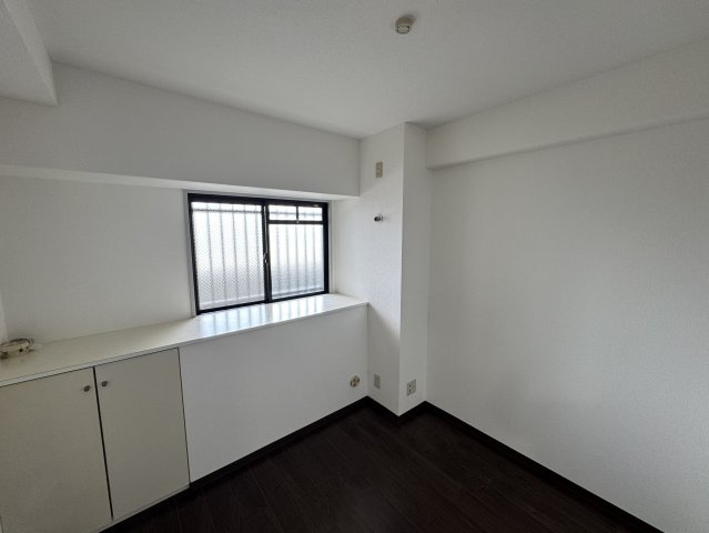 コスモ岩出の洋室