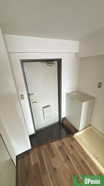 大口平和マンションの玄関