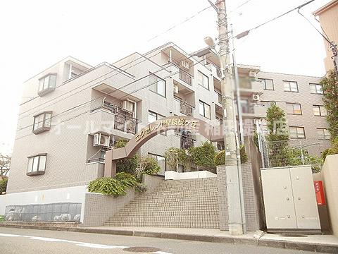 多摩市連光寺２丁目の賃貸マンションのエントランス
