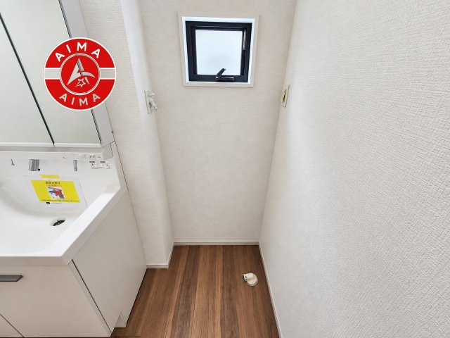 福岡市早良区飯倉6丁目第8-2棟（2号棟）の内観：施工例|毎日の洗濯をスマートに。注目のランドリー空間を確保！