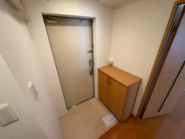 豊中市本町１丁目の賃貸マンションの玄関