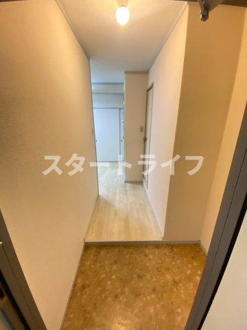 大阪市東淀川区西淡路１丁目の賃貸マンションの玄関