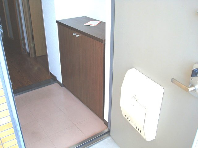 シェーヌ生駒の玄関