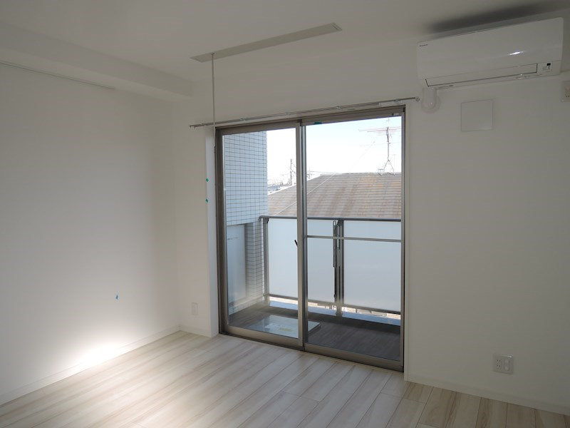 川崎市多摩区菅北浦２丁目の賃貸マンションの居間・リビング