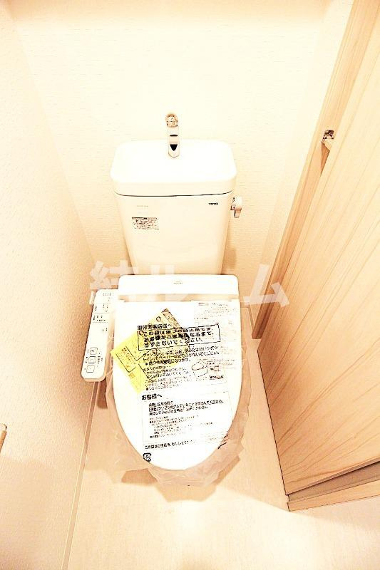 北区十条仲原２丁目の賃貸マンションのトイレ