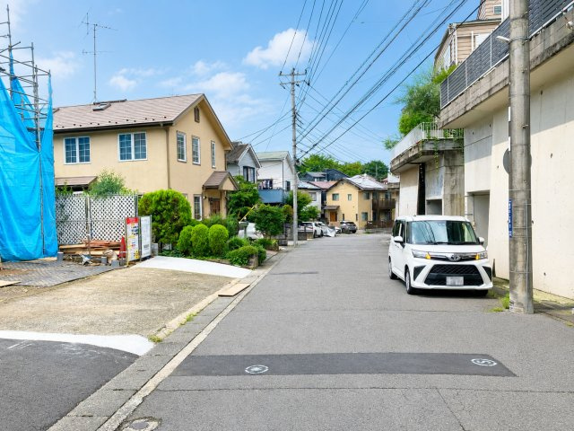 柿の木台　新築戸建　１号棟の前面道路含む現地写真