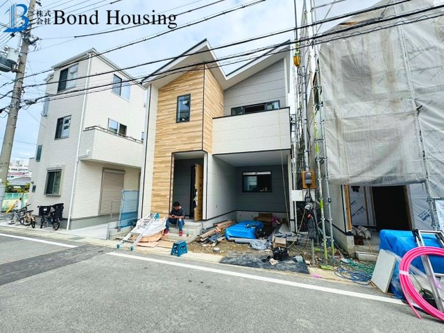 西新町駅徒歩11分　大道町1期　新築2区画　1号棟の前面道路含む現地写真