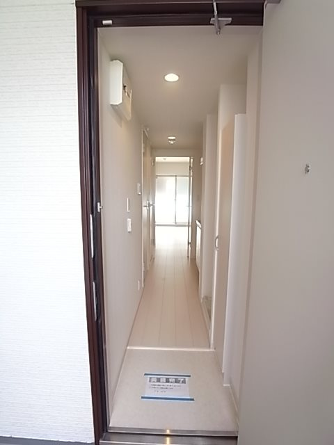 リブリ・グラーデ塚本の玄関