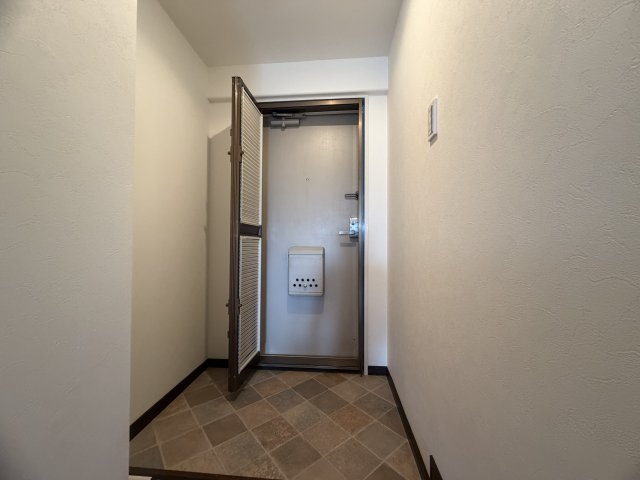 サンシティ朝霧の玄関
