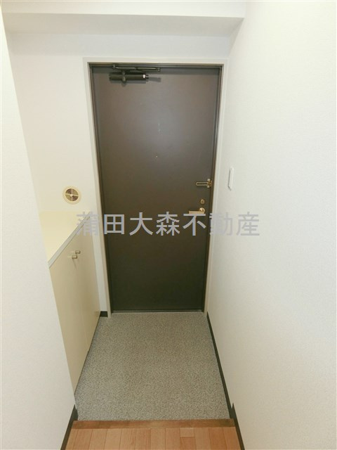グリュック南大井の玄関