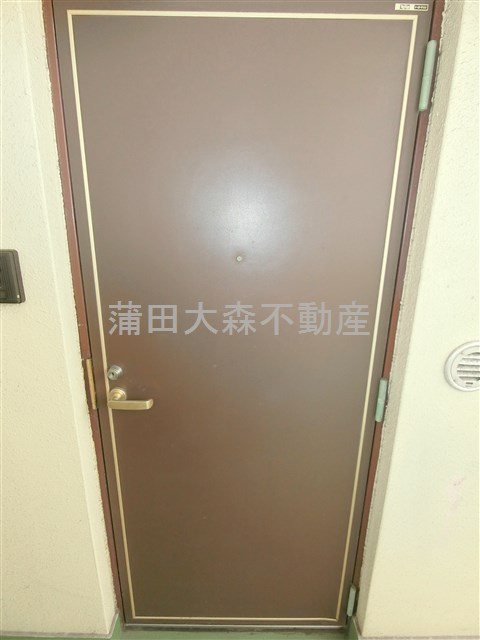 グリュック南大井の玄関
