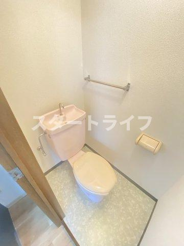 大阪市淀川区西三国２丁目の賃貸マンションのトイレ