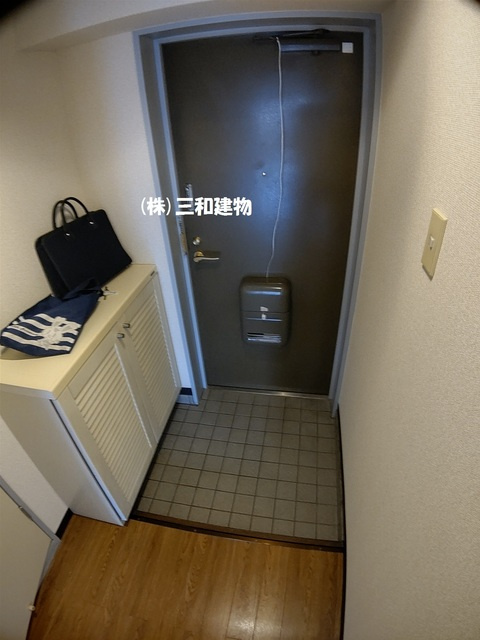 ロイヤルハイツ・ツカサの玄関