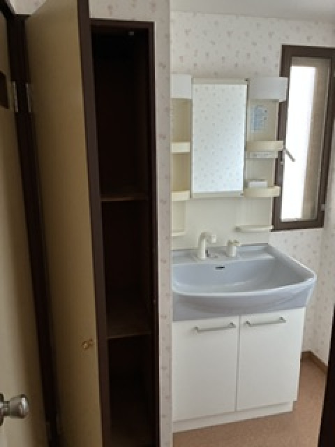 久都内マンションの洗面所