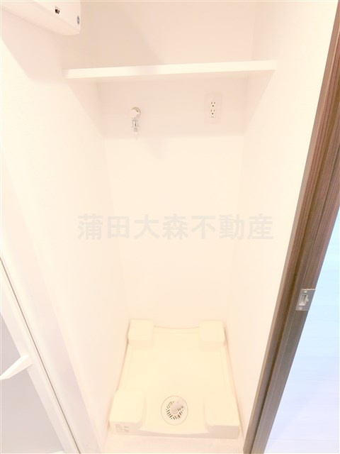 ルフレグランデ多摩川の設備|棚付きの洗濯機置き場