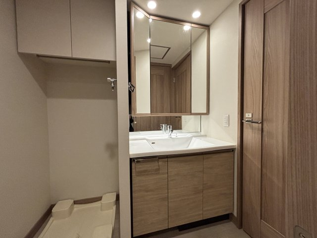 グランドメゾン新梅田タワー THE CLUB RESIDENCEの洗面所