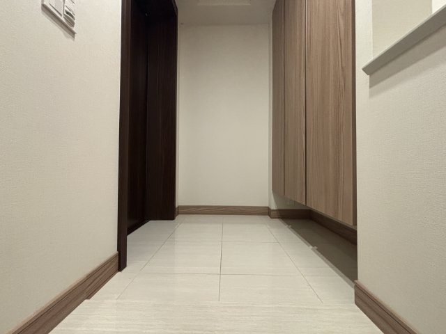 グランドメゾン新梅田タワー THE CLUB RESIDENCEの玄関