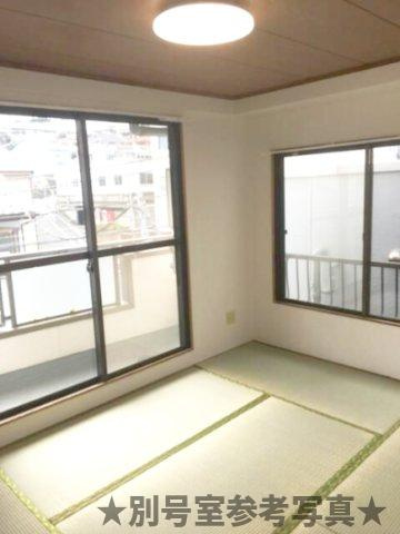 キャピタルコート石川町の寝室